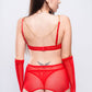 Back view of red rhinestone heart lingerie with mesh skirt and garter straps, bold intimate wear for women