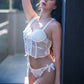 White lace corset lingerie with satin bows, perfect bridal lingerie for honeymoon.