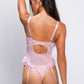 Back view of pink teddy bodysuit with garter straps, sexy bedroom lingerie look.