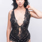 Black lace teddy bodysuit with plunging neckline, perfect for romantic nights and bedroom wear