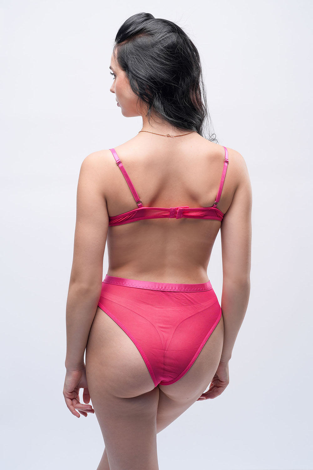 Back view of pink embroidered teddy bodysuit, sexy lingerie designed for bridal nights and bedroom looks.