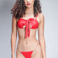 Red bow tie lingerie set with gold chain thong, perfect for romantic nights and honeymoon lingerie looks