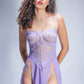 Woman wearing a lavender lace babydoll dress with sheer floral embroidery and side slits, styled with spaghetti straps for a seductive lingerie look.