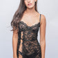 Black lace babydoll dress with heart cutouts, seductive lingerie for anniversaries or bedroom nights.