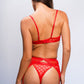 Back view of red lingerie with open garter detail — alluring choice for anniversary or honeymoon nights.