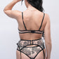 Back view of black lace lingerie set with garter belt and adjustable straps for sexy bedroom style