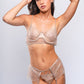 Woman in gold lace lingerie set with garter belt, sensual nightwear for special occasions.