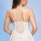 Back view of white lace babydoll nightwear with floral mesh design, intimate and sexy.