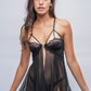 Model in sheer black lace babydoll lingerie, perfect for honeymoon or bedroom nightwear.