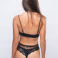 Back view of black lace teddy bodysuit with sheer mesh, sensual lingerie for date nights or honeymoon.
