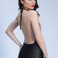 Back view of black lace babydoll lingerie designed for intimate occasions.