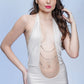 Cream halter babydoll dress with plunging neckline, chic for honeymoon or bedroom seduction.