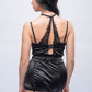 Rear view of black lingerie set with lace racerback bralette and satin skirt, showcasing seductive details for Indian bridal nightwear
