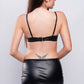 Back view of black leather lingerie skirt and bra, sexy leopard detail for fantasy bedroom wear