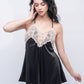 Black satin babydoll with lace cups, perfect for romantic nights and honeymoon lingerie.