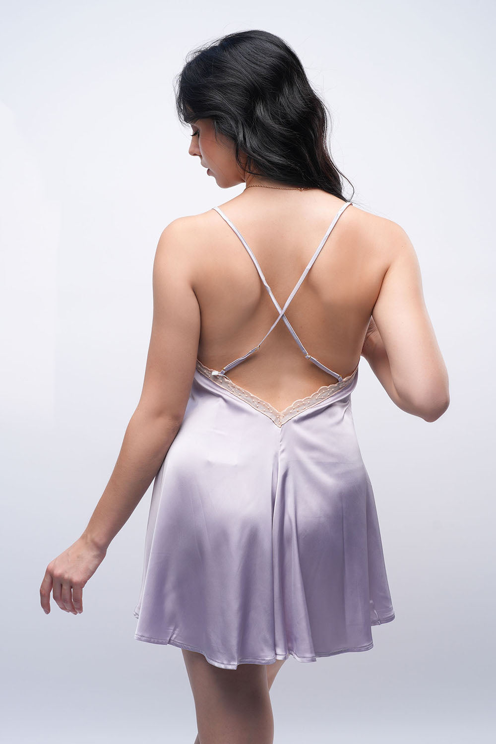 Back view of lavender satin babydoll with lace trim, sexy and comfortable nightwear.