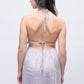 Back view of halter-neck light purple babydoll dress with tie-up straps, designed for intimate nights.