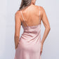 Back view of satin peach babydoll, sexy and elegant bedroom lingerie.