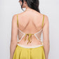 Back view of green satin babydoll with lace tie-up, sexy lingerie for romantic nights.