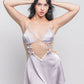 Purple satin babydoll dress with lace bodice and bow accents, intimate nightwear.