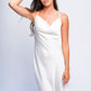 Woman in white satin babydoll dress with cowl neckline, perfect for bridal nightwear or honeymoon.