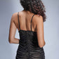 Back view of black ruched mesh babydoll dress, see-through lingerie for special occasions.