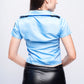 Back view of blue police roleplay costume with short shirt and black mini skirt – flirty cosplay for bedroom fun.